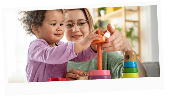 Membership at the Institute of Early Years Education image of early education and care professional and child